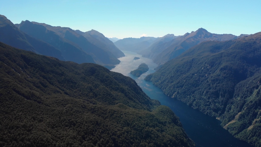 Stunning aerial panoramatic shot of New Zealand impressive fjord. Doubtful Sound Royalty-Free Stock Footage #1069508671