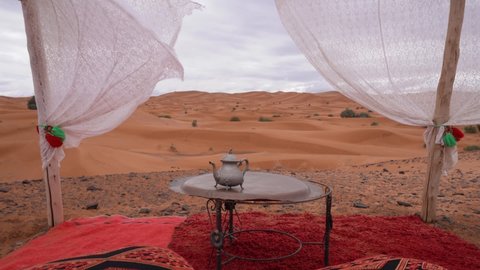 Glamping Camp At Sahara Desert With A View Of Golden Fine Sand At Sand Dunes In Morocco. - wide, static shot