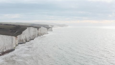 Drone shot along beautiful Seven Sisters white chalk cliffs South England