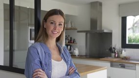 Portrait of beautiful woman standing at home