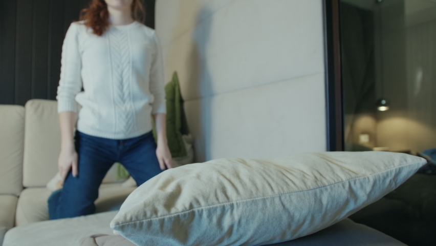 Exhausted Or Bored Young Funny Girl Falls Down On Sofa. Woman Lying Asleep Feeling Lack Of Motivation, Fatigue Or Depression Concept Tired Overworked Person At Home Alone Royalty-Free Stock Footage #1069513534