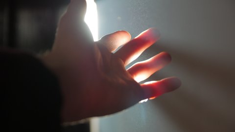 Sun ray man hand left POV dust indoors light