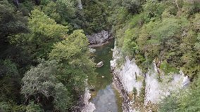 Aerial stunning drone view of a river between two rocky shaped canyon in north Spain.
