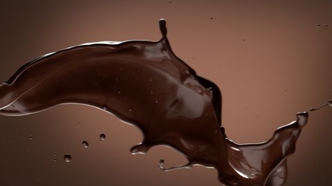 Super slow motion of dark hot chocolate splashing. Filmed on high speed cinema camera, 1000fps.