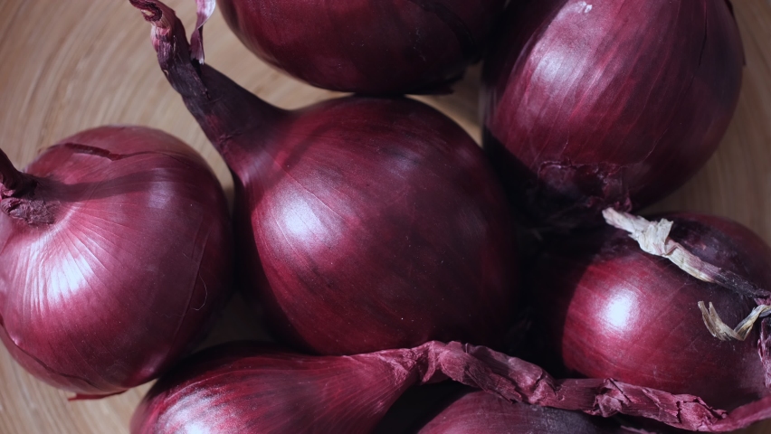 Full Frame Shot Of Purple Onions. Fresh whole onions. Rotation