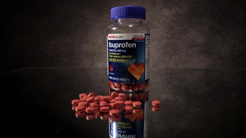 Ibuprofen tablets in close up view - FRANKFURT, GERMANY - MARCH 23, 2021
