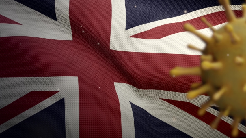 United Kingdom flag waving with the Coronavirus outbreak infecting respiratory system as dangerous flu. Influenza type Covid 19 virus with national Britain banner blowing background-Dan Royalty-Free Stock Footage #1069558018