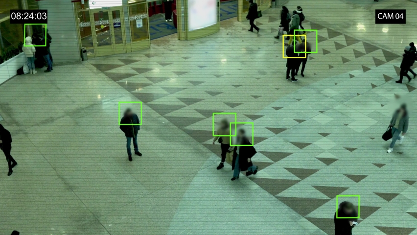 CCTV camera detects people's faces. Scanning the crowd of people walking at the airport. Artificial intelligence analyzes big data.	
