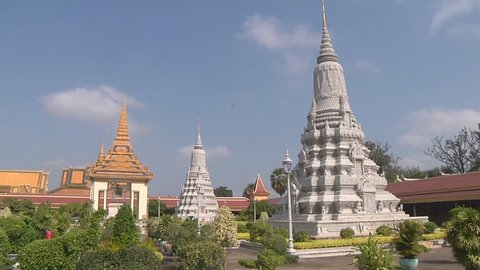 Pan Wide Shot of stupas and the Silver Pagoda at the Royal Palace in Phnom Penh, Cambodia