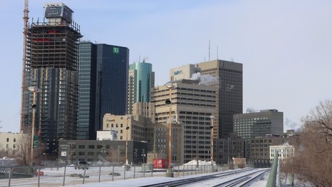 Winnipeg canada mar 1 2021 via rail moves past downtown skyline