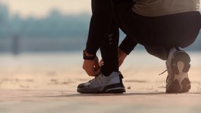 Marathon Runner Sport Shoes Tying Shoelace.Triathlete Cardio Running Endurance Workout Training.Runner Ties Shoelaces Fit Athlete Jogging Running.Triathlon Comptition.Footwear Jogger Fitness Sport Run - Powered by Shutterstock - Get 15% off with code: PIKWIZARD15