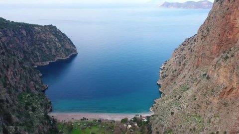 A wonderful view of the sea, under the effect of turquoise color, taken with a drone angle. This video taken at the Kelebekler Valley offers one of the most beautiful views of Turkey to us.