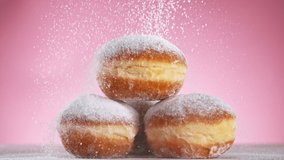 Delicious pastries covered with sugar on pastel background. - Powered by Shutterstock - Get 15% off with code: PIKWIZARD15