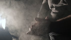  Strongman athlete hands clapping chalk powder sportsman preparing training workout in gym ready for bodybuilding strength exercise slow motion close up - Powered by Shutterstock - Get 15% off with code: PIKWIZARD15