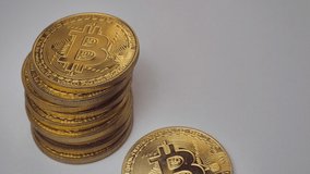 dollars falling near bitcoins. slow motion video.Bitcoin Crypto currency Gold Bitcoin BTC Bit Coin