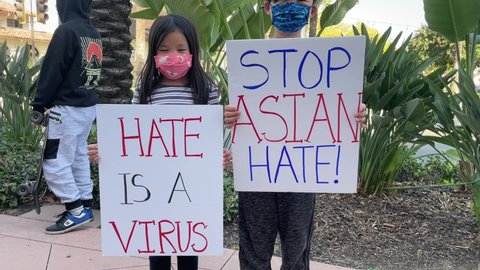 Demonstrators take part in a rally and march to denounce anti-Asian sentiment, racism and hate crimes that have been exacerbated by the COVID-19 pandemic, on March 26, 2021, in Alhambra, California.