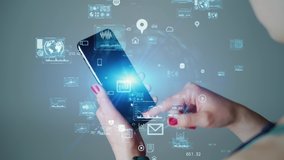 Young woman using a smart phone. Mobile communication network concept. Internet of Things. - Powered by Shutterstock - Get 15% off with code: PIKWIZARD15