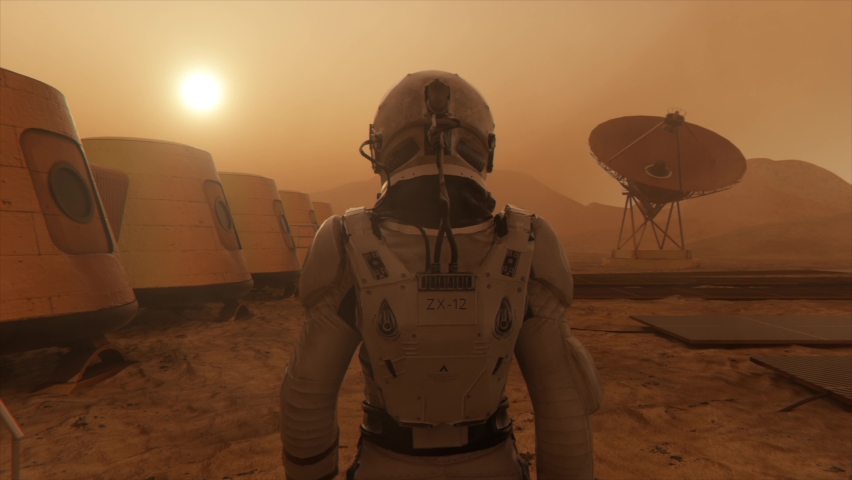 Astronaut on the planet Mars, making a detour around his base. Astronaut walking along the base. Small dust storm. The satellite dish sends data to the ground. Realistic 3D animation | Shutterstock HD Video #1069697998