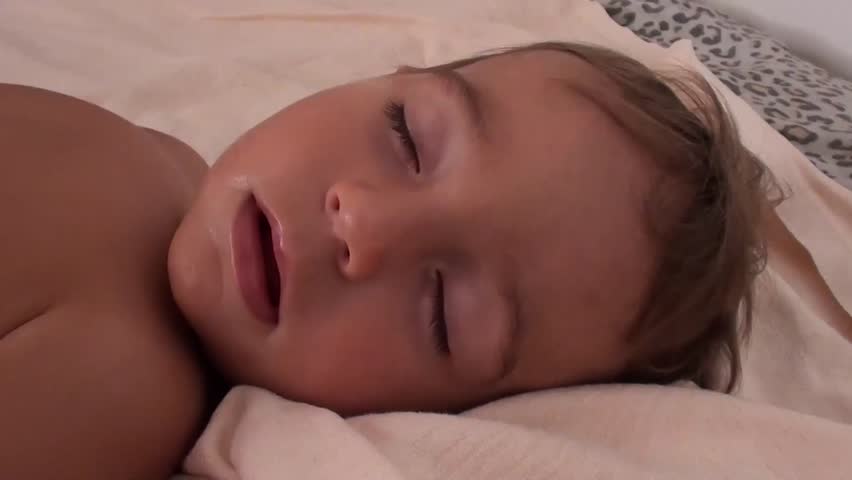 Portrait of sleeping toddler with open mouth
 | Shutterstock HD Video #10696988