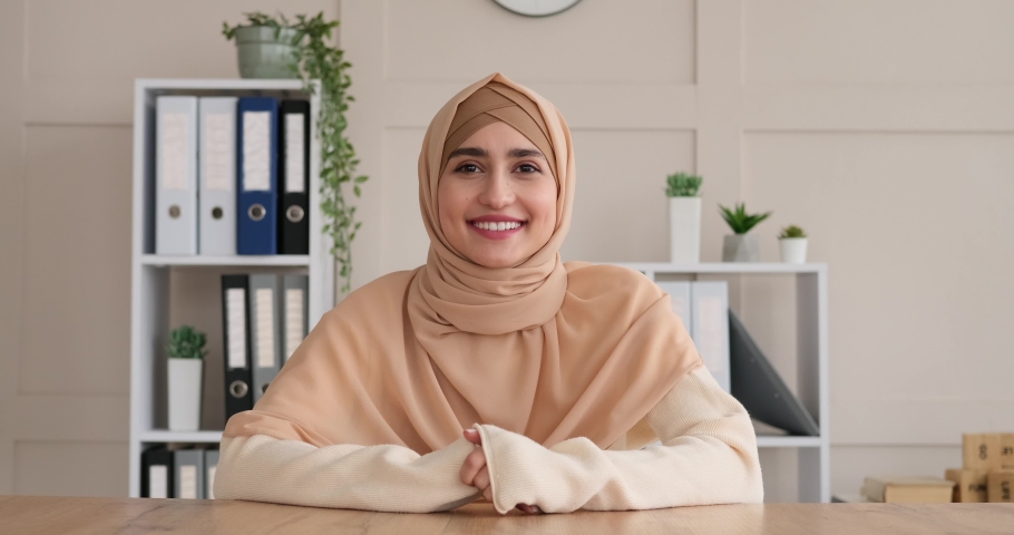 Woman video chatting at office