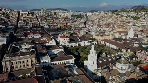 Aerial view of Quito's historic center, over Plaza Grande, next to presidential palace in Ecuador.
