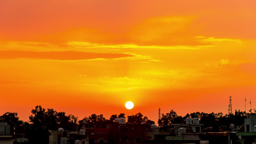 Golden hour sunset over the skyline of the city