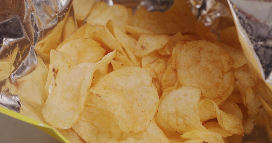 Take Potato chip in package  | Shutterstock HD Video #1069730311