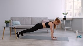 Workout. Sporty Woman Doing Plank Exercise With Hand To Elbow Transition Training At Home. Female Fitness Routine And Lifestyle, Core Strength Exercises Concept. Side View