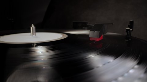 Record player in close-up - playing a vinyl - studio photography