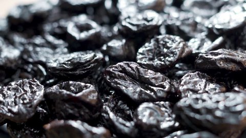 Healthy Natural Dried Fruits, Dried Plums, Prunes. Background of Prunes, Dried Plums. Dried Plums Are Background of Prunes. Prunes, Close-up, Isolated. Vegan Food.