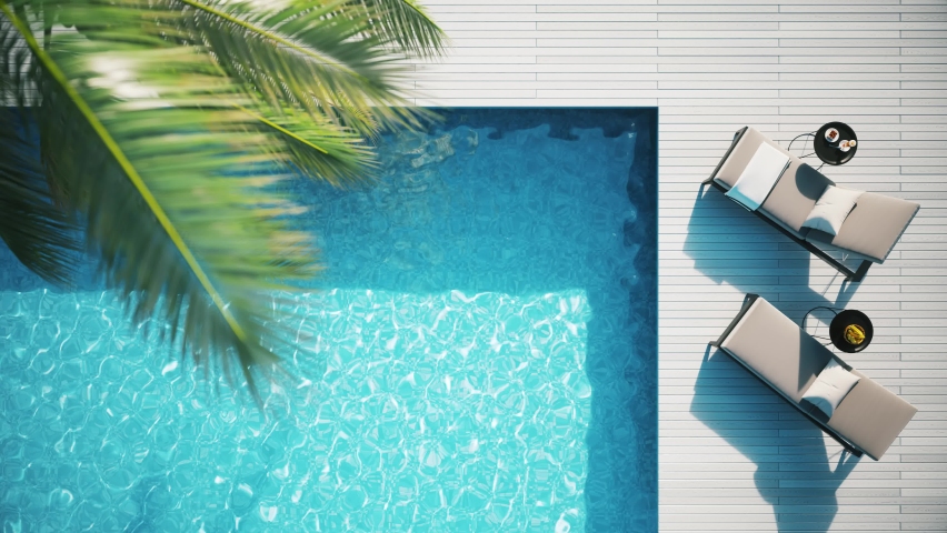Lounge chair on terrace near swimming pool. Top view of pool and lounge area. Tropical vacation concept. Royalty-Free Stock Footage #1069767076