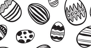 Animation of multiple decorated easter eggs in black and white on white background. easter celebration, springtime and tradition concept digitally generated video.