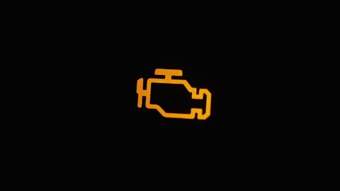Check engine light on, car trouble, engine failure, visit to repair shop. Engine failure, maintenance required. Check engine light symbol that pops up on dashboard.