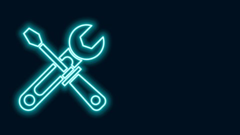 Glowing neon line Screwdriver and wrench tools icon isolated on black background. Service tool symbol. 4K Video motion graphic animation.