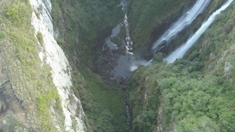Aerial Looking Down Over Long Jungle Canyon Waterfall and River Itaimbezinho Aparados Da Serra Brazil (Drone - 4K)