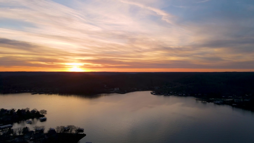 Missouri Sunset over Beautiful Ozarks Lake Reservoir, Aerial Establishing