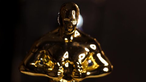 Los Angeles, California , United States - March 26th 2021 : Cinematic Oscars Film Award Statue Rotates, 4K