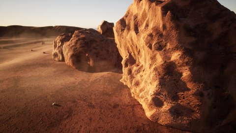 Vehicle on the ground of Mars examining rocks Adlı Stok Video