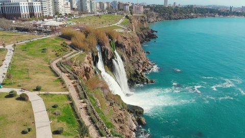 Amazing aerial view of Duden Waterfall and Duden Park  on Mediterranean sea coast in Antalya, Turkey. Seascape with azure water and a steep cliff on a sunny day.