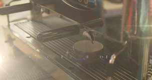 Digital composite video of spots of light against mid section of barista preparing coffee at cafe. coffee shop and business concept