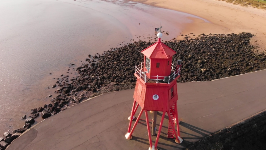 Orbiting around The Groyne lighthouse on South Shields beach, a seaside town near Newcastle upon Tyne.