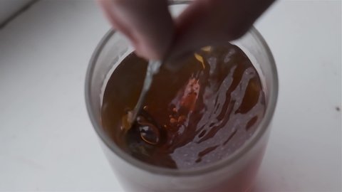 black tea in a glass slow motion video