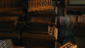 Different size wooden carved chests in gift shop. - Powered by Shutterstock - Get 15% off with code: PIKWIZARD15