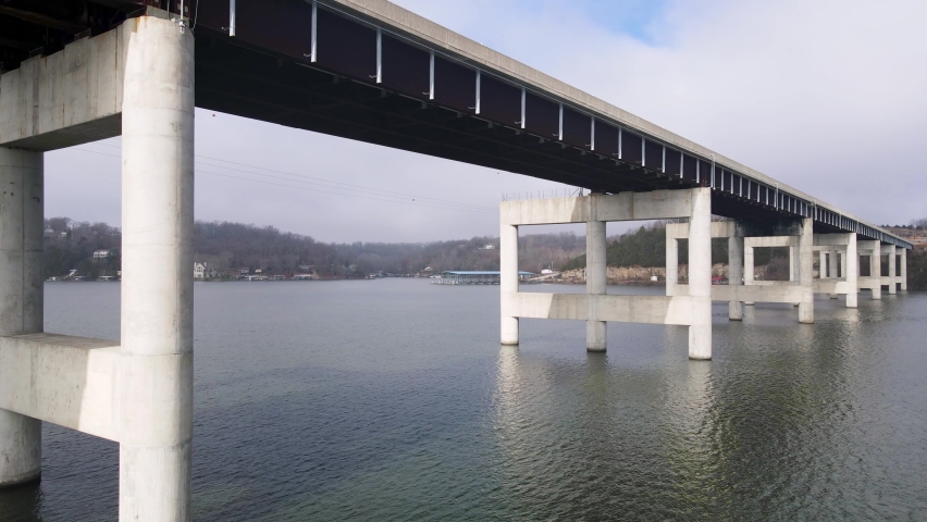Aerial Flying Under Toll Bridge Crossing Ozarks Lake, Missouri