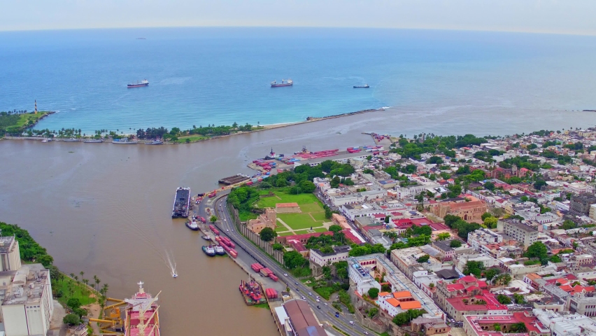 Aerial forward over Ozama river mouth, Santo Domingo. Dominican Republic