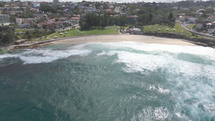 Aerial View Of Bronte Beach In Summer With Crashing Waves - Bronte Park In Sydney, NSW, Australia.