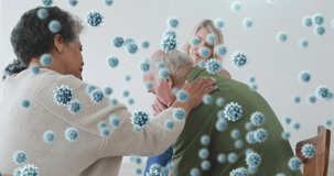 Animation of covid 19 cells over senior woman talking to senior man crying. global coronavirus pandemic concept digitally generated video.