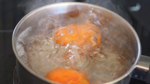 Eggs boiling in the pot in slow motion 180fps
