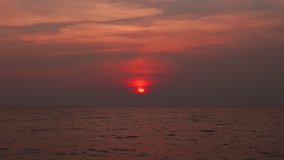 Pastel sunset over the Andaman Sea, Thailand, video, 4 beautiful, waves, water, and sand.