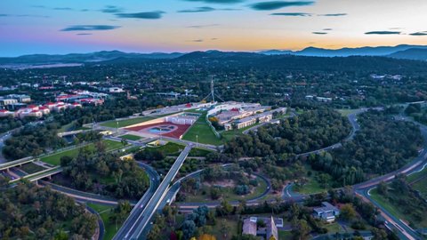Aerial hyperlapse of the Australian Parliament House at evening twilight in Canberra, the Australian Capital Territory 